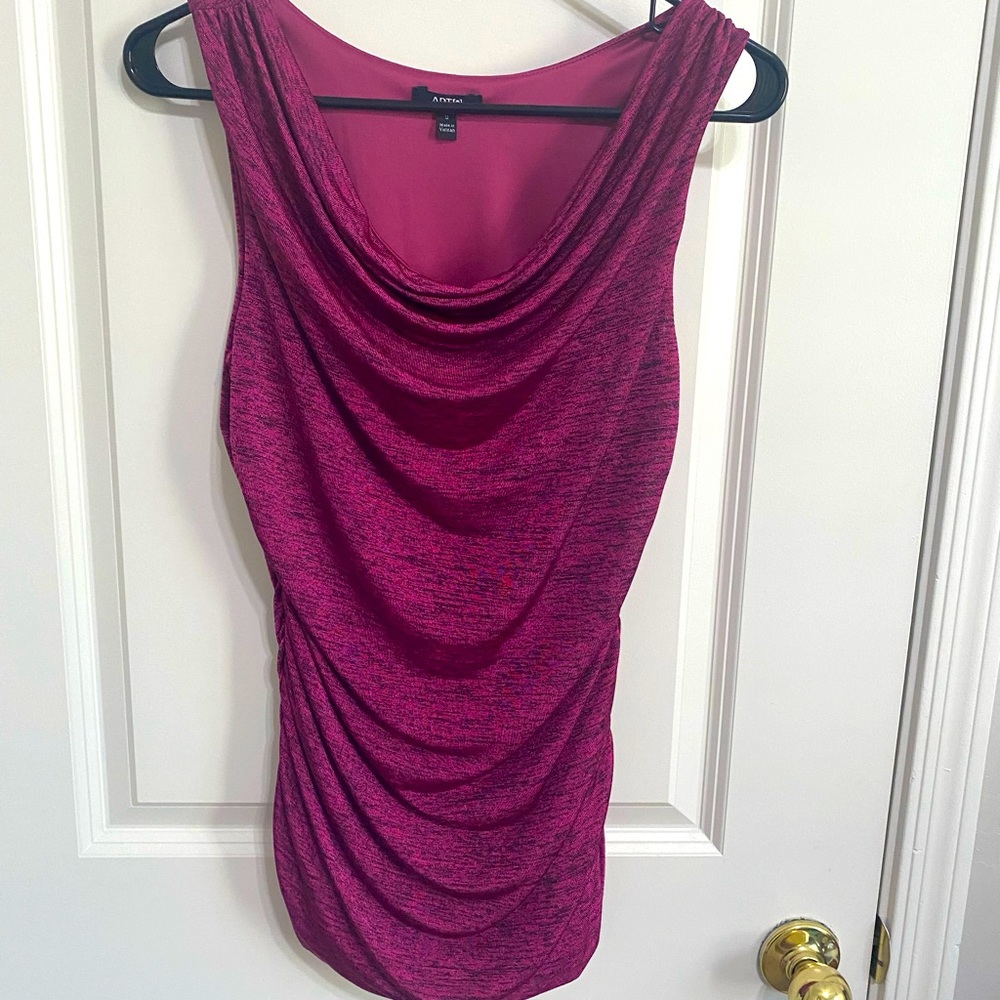 Very pretty form fitting, flattering top.
